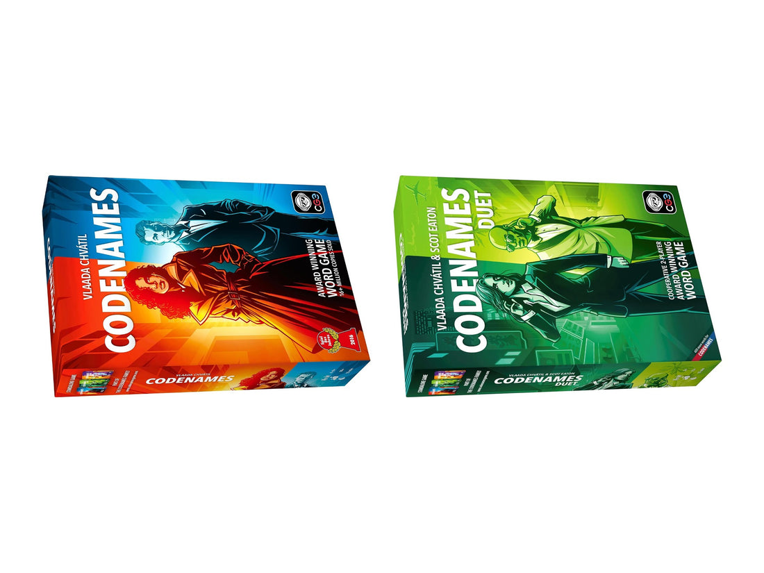 Codenames 2nd Edition and Codenames Duet game boxes side by side, both full boxes shown at an angle on white — Codenames vs Codenames Duet comparison